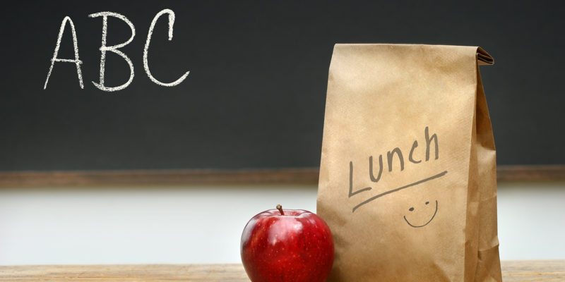 Paper lunch bag on desk